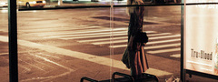 girl, at a, bus stop